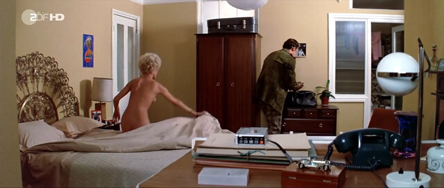 Delphine Seyrig nude – The Black Windmill (1974)