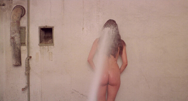 Tania Busselier nude - Ilsa, the Wicked Warden (1977)