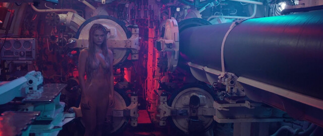 Dela Reilley nude – What Lurks Beneath (2024)