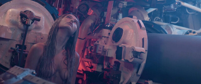 Dela Reilley nude – What Lurks Beneath (2024)