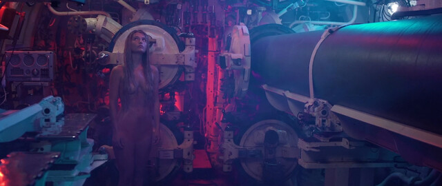 Dela Reilley nude – What Lurks Beneath (2024)