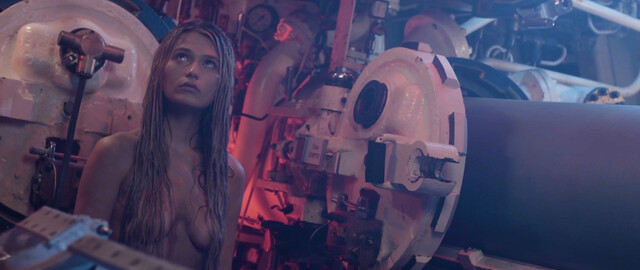 Dela Reilley nude – What Lurks Beneath (2024)